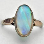 9ct Gold Australian Solid Opal Ring.. Click for more information...