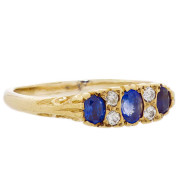 9ct gold Gypsy Ring 3 Blue Sapphires 4 Diamonds.. Click for more information...